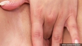 Teen blonde fingering her pussy
