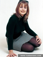 Teen blonde poses undressed