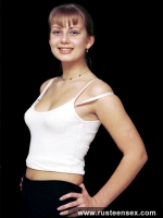 Teen blonde poses undressed