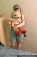 Teen blonde masturbates with her old bear toy
