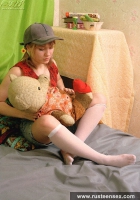 Teen blonde masturbates with her old bear toy
