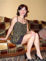 Russian teen brunette posing on the coach