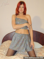 Pantyhose redhead girl almost cums wearing her lovely black