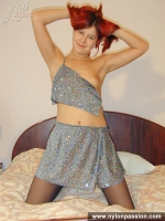 Pantyhose redhead girl almost cums wearing her lovely black