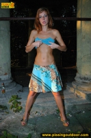 Pissing teen in outdoor night