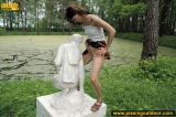 Teen pissing outdoor on a statue