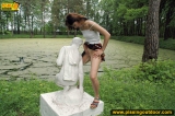 Teen pissing outdoor on a statue