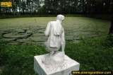 Teen pissing outdoor on a statue