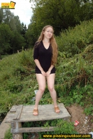 Pissing teen on the old table