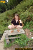 Pissing teen on the old table