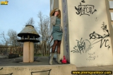 Outdoor pissing near graffiti