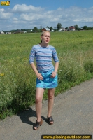 Outdoor pissing on a village road