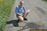 Outdoor pissing on a village road
