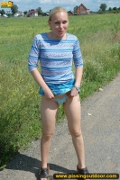 Outdoor pissing on a village road