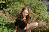 Outdoor pissing in the summer forest on the road