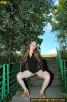Pissing on the ladder in the park outdoor