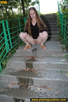 Pissing on the ladder in the park outdoor