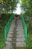 Pissing on the ladder in the park outdoor