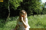 Pissing outdoor deep in the forest on the old table