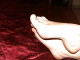 Galena \'s Feet - Foot model spreads curls toes shows soles