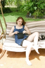Lady relaxing in black nylon panties