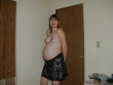 Young and pregnant naked