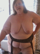 Exposing myself in a hotel in front of an open window.