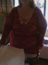 Exposing myself in a hotel in front of an open window.