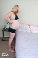 Hot preggo Tegan is using a small vibrator