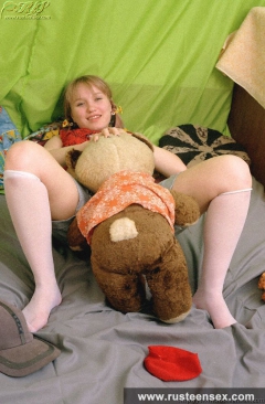 Teen blonde masturbates with her old bear toy - N