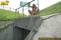 Blonde teen pisses from the height outdoor - N