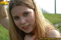 Blonde teen pisses from the height outdoor - N