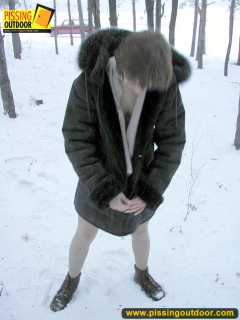 Pissing outdoor in the snow drift is a fun - N