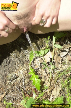 Teen girl enjoys pissing outdoor in the forest - N