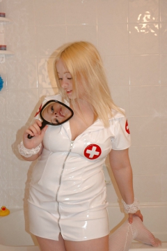 Chubby blonde posing as a nurse - N