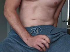 Masturbating and Cumming Through Gray Sweatpants