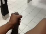 JERKING BIG BLACK COCK AT PUBLIC TOILET