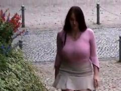 Busty girl walking, no bra, jiggling