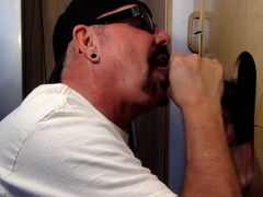 Gloryhole DILF wildly sucks Black meat