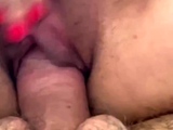 On top of him playing with his cock