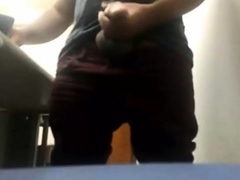 Brazilian Daddy Strokes His Big Uncut Cock At Work