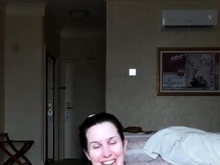 Busty curly brunette with big boobs fucks on couch