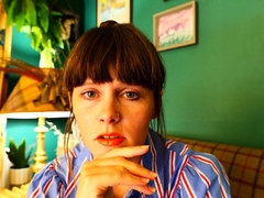 cute-curly-brunette-solo-webcam-masturbation